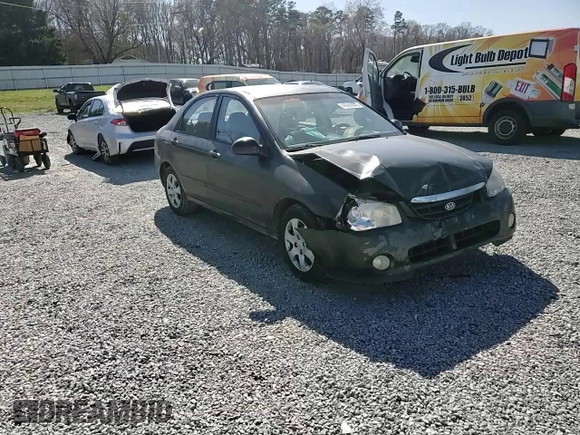 2004 Kia Spectra LX with VIN KNAFE121X45021922, listed as a Copart auction lot 49989845 with 184,189 mi miles and Salvage Title. Bid and sale history available at carsss.com. Image 10.