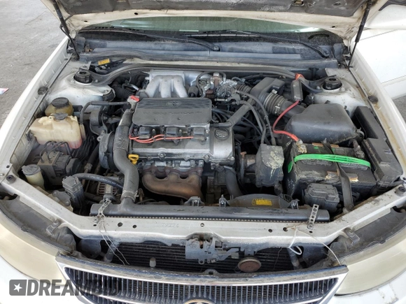 1999 Toyota Solara SE z VIN 2T1CF22P4XC171139, wystawiony jako Copart lot #58728195 z przebiegiem 148 703 mil mil oraz Szkoda całkowita • Salvage title. Historia ofert i sprzedaży dostępna na DreamBid. Obrazek 11.