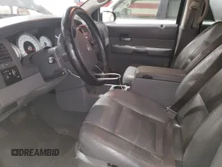 2004 Dodge Durango SLT z VIN 1D4HD48N04F216824, wystawiony jako Copart lot #87756545 z przebiegiem Nie podano mil oraz Nie do naprawy • Non repairable. Historia ofert i sprzedaży dostępna na DreamBid. Obrazek 7.