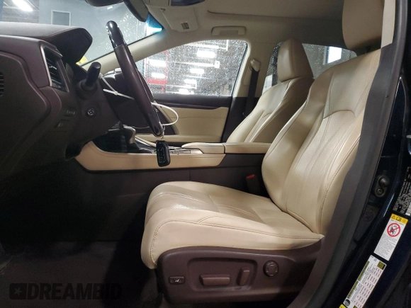 2018 Lexus RX 450h with VIN 2T2BGMCA9JC021481, listed as a Copart auction lot 57111405 with 186,533 mi miles and Salvage title. Bid and sale history available at DreamBid. Image 7.