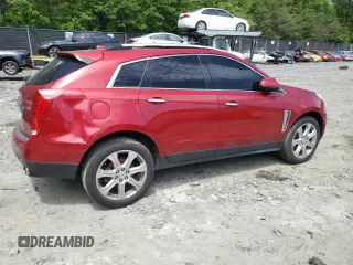 2016 Cadillac SRX Premium Collection with VIN 3GYFNDE3XGS508897, listed as a Copart auction lot 57886515 with 163,477 mi miles and Salvage title. Bid and sale history available at DreamBid. Image 3.
