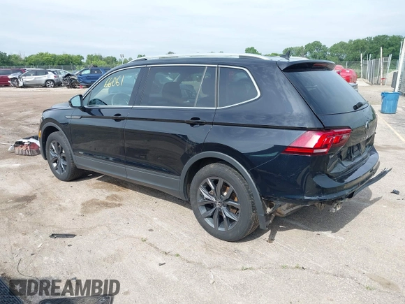 2023 Volkswagen Tiguan SE with VIN 3VVMB7AXXPM003447, listed as a IAAI auction lot 42566061 with 39,185 mi miles and . Bid and sale history available at DreamBid. Image 3.