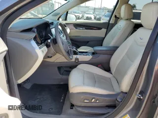 2020 Cadillac XT6 FWD Premium Luxury with VIN 1GYKPCRS5LZ201302, listed as a Copart auction lot 55103225 with 61,527 mi miles and Salvage Title. Bid and sale history available at carsss.com. Image 7.