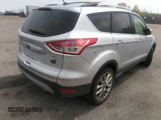 2016 Ford Escape SE with VIN 1FMCU9G91GUA29242, listed as a IAAI auction lot 42099898 with 125,330 mi miles. Bid and sale history available at carsss.com. Image 4.