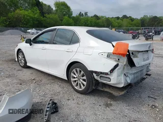 2018 Toyota Camry LE z VIN 4T1B11HK2JU096477, wystawiony jako IAAI lot #42043367 z przebiegiem 116 915 mil mil oraz . Historia ofert i sprzedaży dostępna na DreamBid. Obrazek 3.