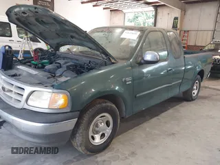 2000 Ford F-150 XL with VIN 1FTRX17L7YNA66620, listed as a IAAI auction lot 42622639 with Not provided miles and . Bid and sale history available at DreamBid. Image 2.