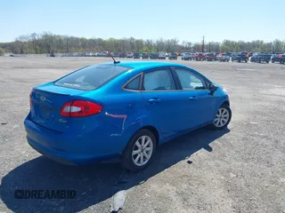 2012 Ford Fiesta SE with VIN 3FADP4BJXCM125881, listed as a IAAI auction lot 42044455 with 156,804 mi miles. Bid and sale history available at carsss.com. Image 4.