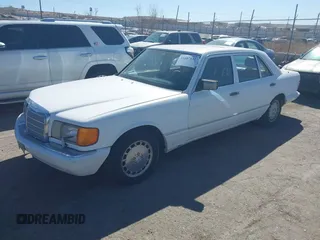 1989 Mercedes-Benz 560 with VIN WDBCA39DXKA433631, listed as a IAAI auction lot 41687132 with 137,621 mi miles and . Bid and sale history available at DreamBid. Image 2.