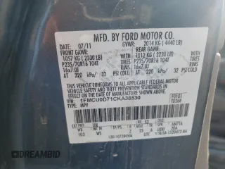 2012 Ford Escape XLT z VIN 1FMCU0D71CKA38530, wystawiony jako Copart lot #54211035 z przebiegiem 136 193 mil mil oraz Szkoda całkowita • Salvage title. Historia ofert i sprzedaży dostępna na DreamBid. Obrazek 13.