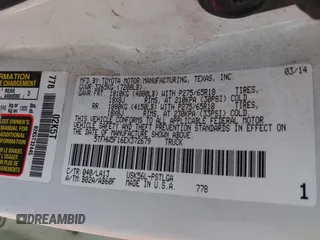 2014 Toyota Tundra 4WD Truck LTD with VIN 5TFHW5F16EX372679, listed as a IAAI auction lot 41736049 with 247,000 mi miles. Bid and sale history available at carsss.com. Image 9.