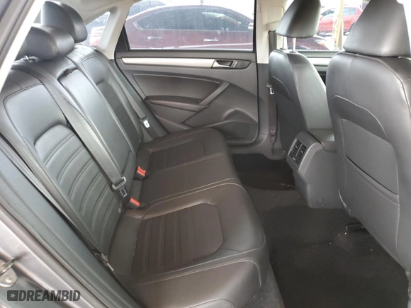 2015 Volkswagen Passat 1.8T Sport with VIN 1VWBT7A35FC009590, listed as a Copart auction lot 69564634 with 61,959 mi miles and Salvage Title. Bid and sale history available at carsss.com. Image 11.