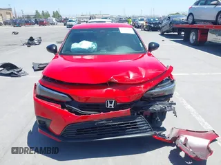 2023 Honda Civic Sport with VIN 2HGFE2F5XPH548055, listed as a IAAI auction lot 42513994 with 37,502 mi miles and . Bid and sale history available at DreamBid. Image 13.