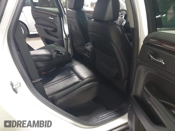 2012 Cadillac SRX Premium Collection with VIN 3GYFNFE39CS561614, listed as a IAAI auction lot 42529959 with 59,088 mi miles and . Bid and sale history available at DreamBid. Image 8.