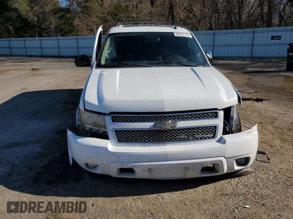 2011 Chevrolet Suburban LT with VIN 1GNSCJE01BR335269, listed as a Copart auction lot 87547175 with 253,312 mi miles and Salvage Title. Bid and sale history available at carsss.com. Image 5.