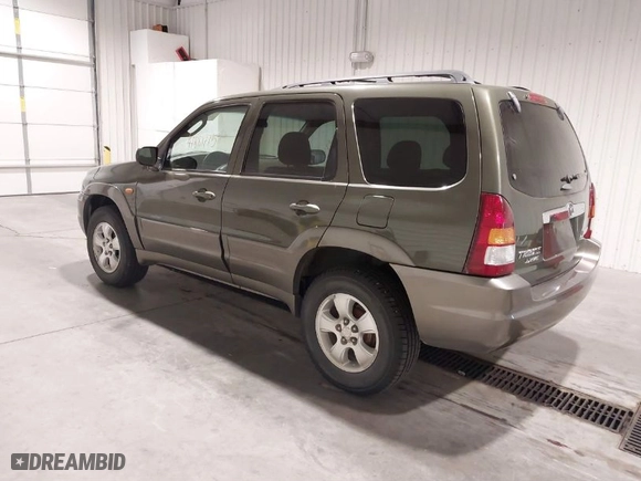 2002 Mazda Tribute LX with VIN 4F2YU08192KM65677, listed as a IAAI auction lot 41881715 with 131,837 mi miles. Bid and sale history available at carsss.com. Image 3.