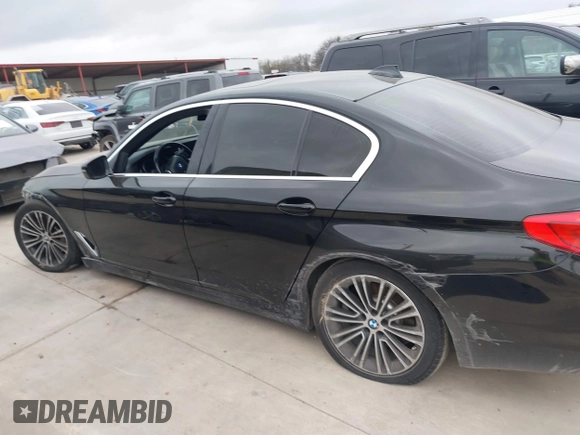 2019 BMW 5 Series 530i with VIN WBAJA5C50KWW38431, listed as a IAAI auction lot 41483263 with 94,436 mi miles. Bid and sale history available at carsss.com. Image 14.