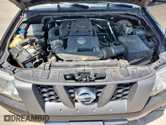 2007 Nissan Xterra SE z VIN 5N1AN08U07C505909, wystawiony jako Copart lot #59867365 z przebiegiem 128 097 mil mil oraz Szkoda całkowita • Salvage title. Historia ofert i sprzedaży dostępna na DreamBid. Obrazek 12.