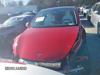 2023 Tesla Model Y Long Range with VIN 7SAYGDEE0PA202150, listed as a IAAI auction lot 41735258 with 22,131 mi miles and . Bid and sale history available at DreamBid. Image 12.