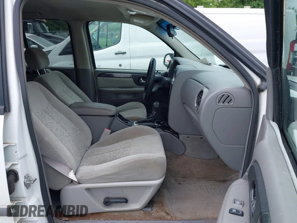 2006 GMC Envoy SLE z VIN 1GKDT13S562116159, wystawiony jako IAAI lot #42361666 z przebiegiem 243 466 mil mil oraz . Historia ofert i sprzedaży dostępna na DreamBid. Obrazek 5.