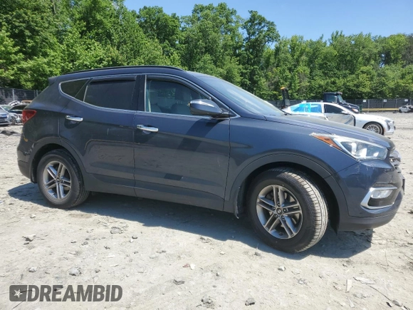 2017 Hyundai Santa Fe 2.4L z VIN 5NMZUDLB7HH028678, wystawiony jako Copart lot #57557855 z przebiegiem 102 049 mil mil oraz Szkoda całkowita • Salvage title. Historia ofert i sprzedaży dostępna na DreamBid. Obrazek 4.