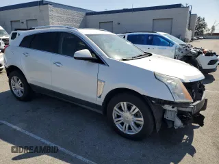 2015 Cadillac SRX Luxury Collection z VIN 3GYFNBE31FS634519, wystawiony jako Copart lot #57292645 z przebiegiem 93 777 mil mil oraz Szkody całkowita. Historia ofert i sprzedaży dostępna na DreamBid. Obrazek 4.