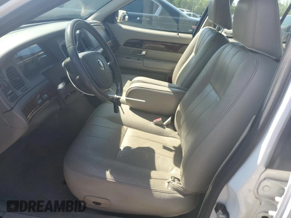 2008 Mercury Grand Marquis LS z VIN 2MEFM75V78X601929, wystawiony jako Copart lot #52130555 z przebiegiem 79 500 mil mil oraz Szkody całkowita. Historia ofert i sprzedaży dostępna na DreamBid. Obrazek 7.
