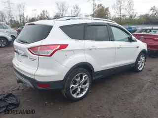 2015 Ford Escape Titanium with VIN 1FMCU9J95FUB91253, listed as a IAAI auction lot 40776894 with 146,855 mi miles. Bid and sale history available at carsss.com. Image 4.