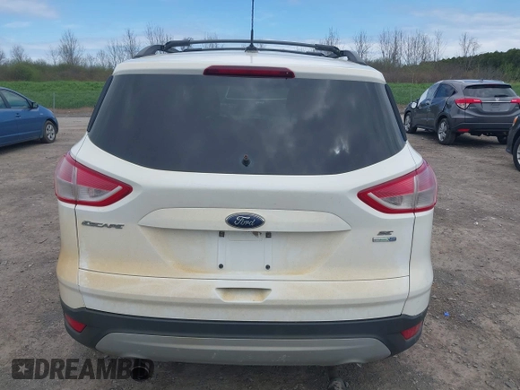 2013 Ford Escape SE with VIN 1FMCU9GX7DUA96986, listed as a IAAI auction lot 42160197 with 193,189 mi miles and . Bid and sale history available at DreamBid. Image 16.