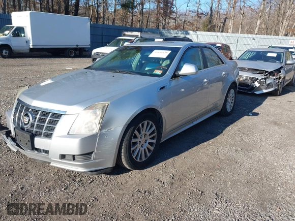 2012 Cadillac CTS Sedan Luxury with VIN 1G6DG5E50C0116725, listed as a IAAI auction lot 41694928 with 114,214 mi miles. Bid and sale history available at carsss.com. Image 2.