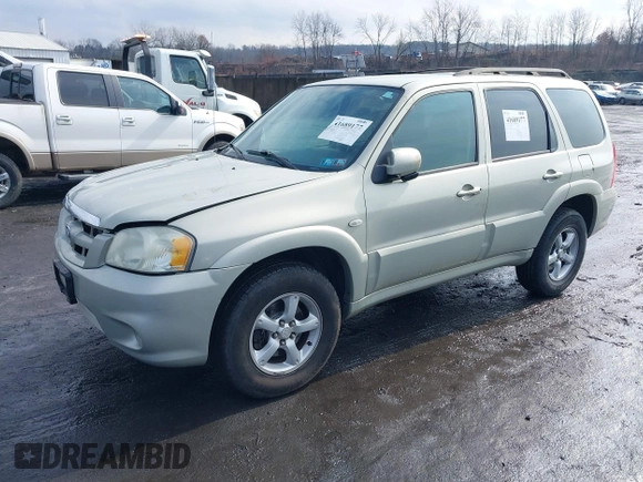 2006 Mazda Tribute S with VIN 4F2YZ04136KM15337, listed as a IAAI auction lot 41689177 with 153,720 mi miles and . Bid and sale history available at DreamBid. Image 2.