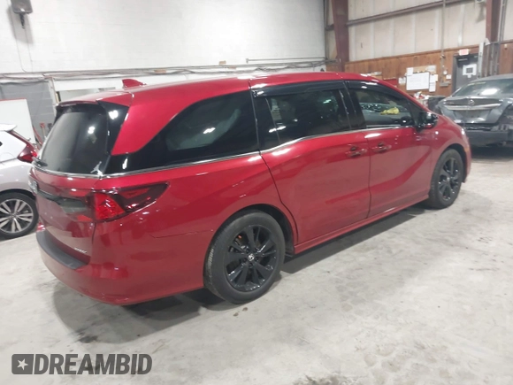 2023 Honda Odyssey Sport z VIN 5FNRL6H75PB054893, wystawiony jako IAAI lot #41984321 z przebiegiem 17 383 mil mil oraz . Historia ofert i sprzedaży dostępna na DreamBid. Obrazek 4.