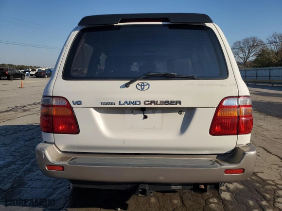 1999 Toyota Land Cruiser with VIN JT3HT05J8X0049750, listed as a Copart auction lot 77547144 with 168,435 mi miles and Salvage Title. Bid and sale history available at carsss.com. Image 6.