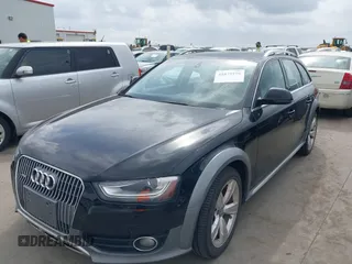 2014 Audi allroad Premium Plus with VIN WA1UFAFL2EA092988, listed as a IAAI auction lot 41879196 with 147,063 mi miles. Bid and sale history available at carsss.com. Image 2.