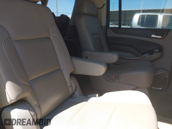 2015 Chevrolet Suburban LTZ with VIN 1GNSCKKC3FR113388, listed as a IAAI auction lot 41867964 with 238,530 mi miles and . Bid and sale history available at DreamBid. Image 8.