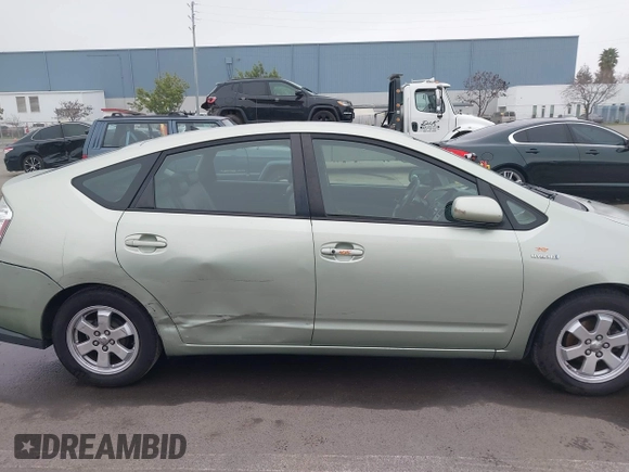 2006 Toyota Prius with VIN JTDKB20U763158151, listed as a IAAI auction lot 41637561 with 223,156 mi miles. Bid and sale history available at carsss.com. Image 13.