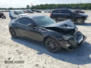 2014 Scion FR-S z VIN JF1ZNAA1XE8707871, wystawiony jako Copart lot #57945695 z przebiegiem 140 517 mil mil oraz Czysty tytuł • Clean title. Historia ofert i sprzedaży dostępna na DreamBid. Obrazek 4.