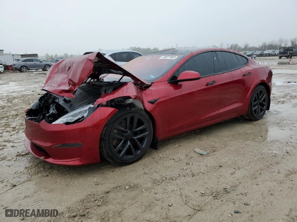 2024 Tesla Model S with VIN 5YJSA1E52RF537354, listed as a Copart auction lot 43077365 with 8,934 mi miles and Salvage Title. Bid and sale history available at carsss.com. Image 1.