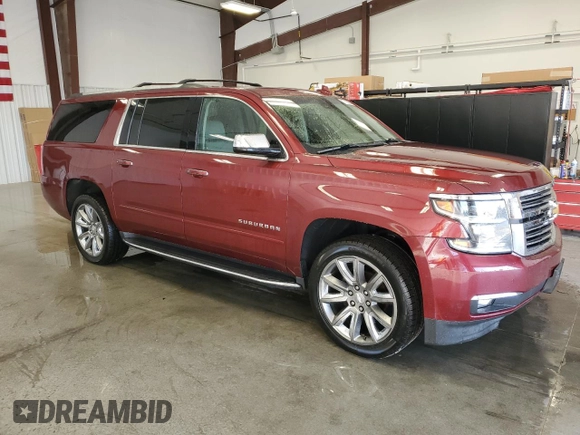 2019 Chevrolet Suburban Premier with VIN 1GNSKJKC6KR293389, listed as a Copart auction lot 77700264 with 49,057 mi miles and Salvage Title. Bid and sale history available at DreamBid. Image 4.