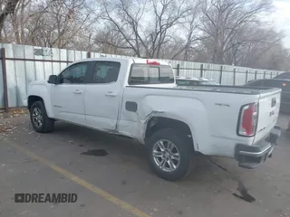 2019 GMC Canyon 4WD SLE z VIN 1GTG6CEN5K1297945, wystawiony jako IAAI lot #41308105 z przebiegiem 93 226 mil mil oraz . Historia ofert i sprzedaży dostępna na DreamBid. Obrazek 3.