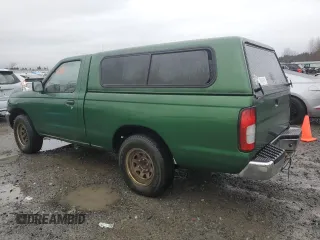 1998 Nissan Frontier XE with VIN 1N6DD21S4WC345165, listed as a Copart auction lot 87465104 with Not provided miles and Clean title. Bid and sale history available at DreamBid. Image 2.