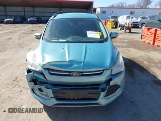 2013 Ford Escape SEL with VIN 1FMCU9HX2DUA71931, listed as a IAAI auction lot 41757318 with 149,344 mi miles. Bid and sale history available at carsss.com. Image 12.
