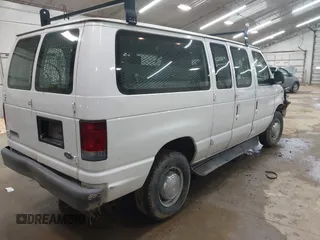 2006 Ford Econoline Passenger XL with VIN 1FBNE31LX6DB02171, listed as a IAAI auction lot 42084666 with 86,624 mi miles. Bid and sale history available at carsss.com. Image 4.