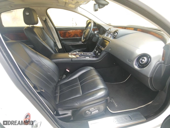 2013 Jaguar XJ with VIN SAJWJ1CD7D8V49599, listed as a Copart auction lot 54008915 with 133,163 mi miles and Clean Title. Bid and sale history available at carsss.com. Image 5.