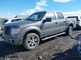 2014 Ford F-150 XL with VIN 1FTFW1EF2EFA76657, listed as a IAAI auction lot 41668284 with 130,226 mi miles. Bid and sale history available at carsss.com. Image 17.