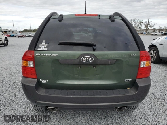 2005 Kia Sportage LX with VIN KNDJF723657074234, listed as a Copart auction lot 86792794 with 97,548 mi miles and Salvage Title. Bid and sale history available at carsss.com. Image 6.