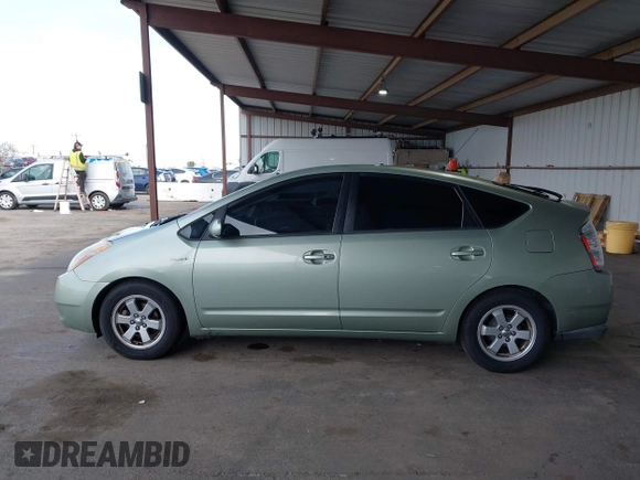 2007 Toyota Prius with VIN JTDKB20U077578859, listed as a IAAI auction lot 41985697 with 185,897 mi miles and . Bid and sale history available at DreamBid. Image 14.