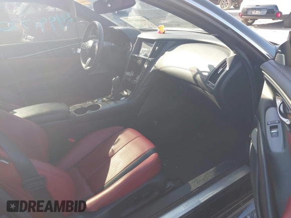 2022 Infiniti Q60 Red Sport 400 with VIN JN1FV7LK0NM660799, listed as a IAAI auction lot 41991772 with 26,997 mi miles and . Bid and sale history available at DreamBid. Image 5.