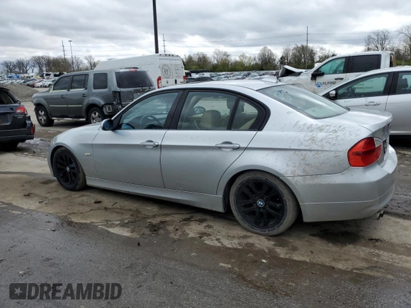 2007 BMW 3 Series 328xi with VIN WBAVC93517KZ71576, listed as a Copart auction lot 53523475 with 185,028 mi miles and Salvage title. Bid and sale history available at DreamBid. Image 2.