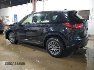 2016 Mazda CX-5 Sport with VIN JM3KE4BY9G0785317, listed as a Copart auction lot 48300935 with 32,592 mi miles and Salvage Title. Bid and sale history available at carsss.com. Image 2.