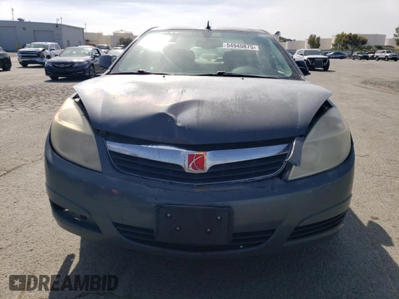 2009 Saturn Aura XE with VIN 1G8ZS57B59F211561, listed as a Copart auction lot 54940875 with 139,479 mi miles and Salvage Title. Bid and sale history available at DreamBid. Image 5.